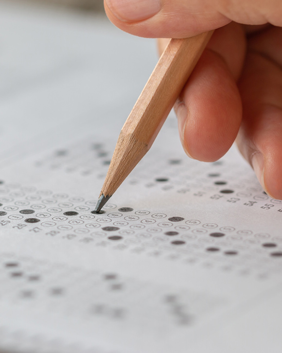 close up of exam GCSE results being completed