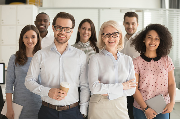 group of smiling, smart, happy teachers